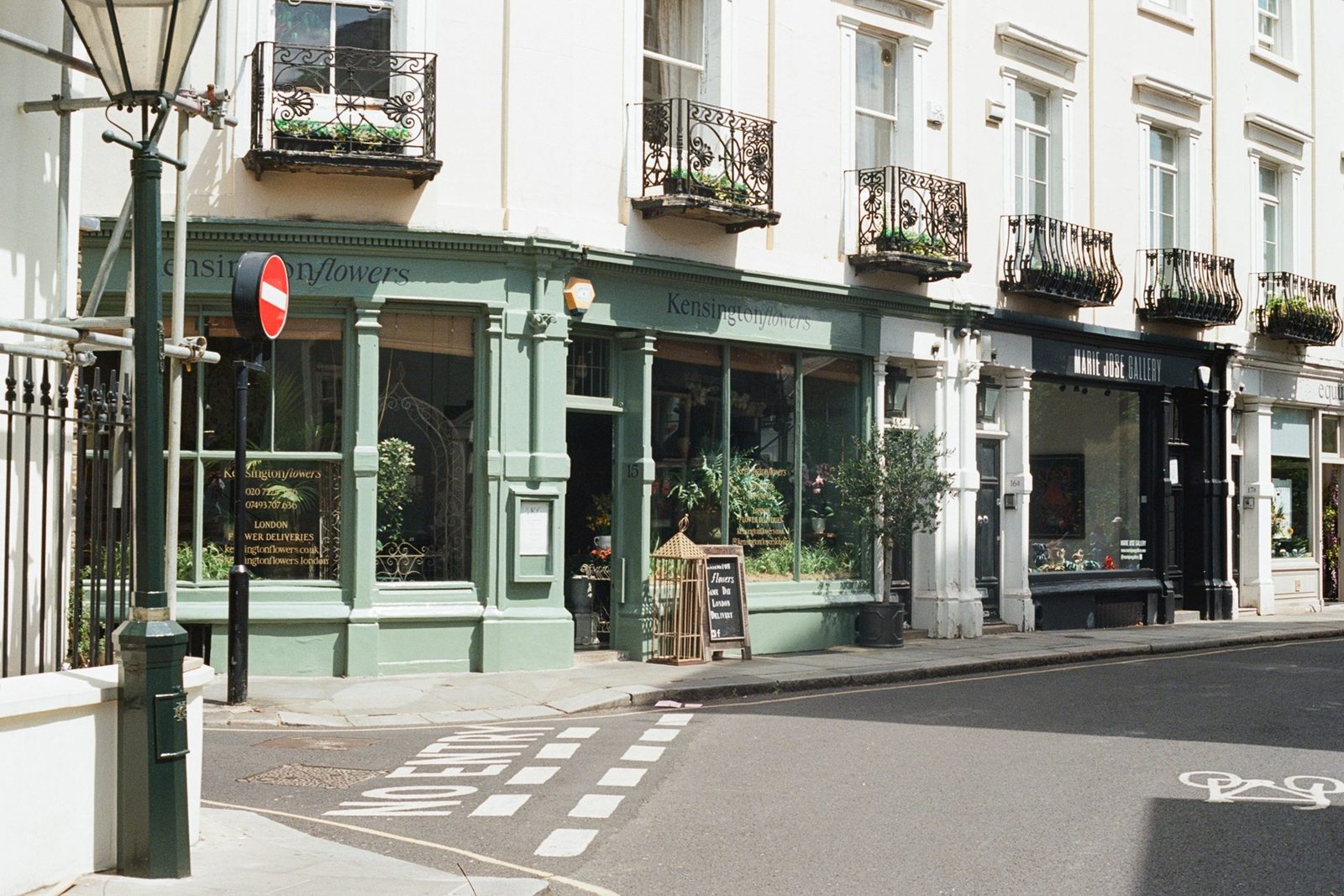 A flower shop on a street corner in London